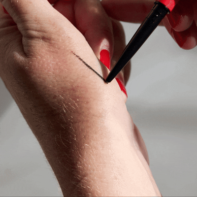 Testing Bakeup Beauty Define Me eyeliner line on skin, demo GIF